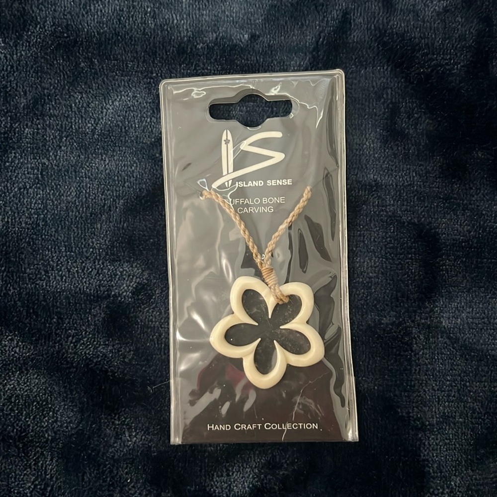 Buffalo bone necklace carving